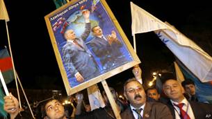 http://wscdn.bbc.co.uk/worldservice/assets/images/2013/11/03/131103150712_supporters_ilham_alyiev_512x288_ap.jpg